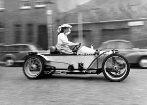 Louise Pomeroy pictured driving a Super two-seater 1910 cycle car outside the Royal