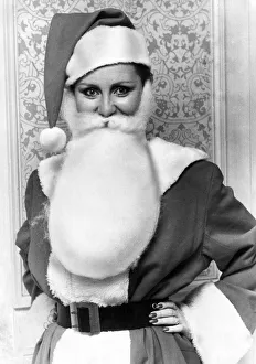 Lulu dressed as Father Christmas. She will be appearing at the Rainbow Theatre over