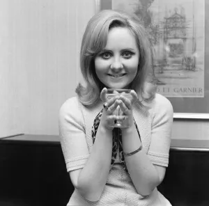 Lulu, pictured at her London flat celebrating after she has learnt that her single To Sir