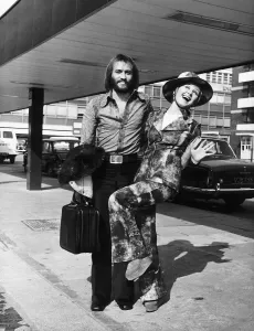 Lulu singer with her husband Maurice Gibb of the pop group the Bee Gees arrive at London