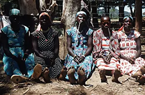 Core78 Prints: Luo women smoking traditional pipes Nyanza Province South West Kenya Africa