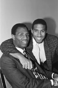 Footballers Prints: Luther Blissett, (left, in striped tie) and John Barnes (right