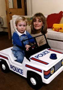 Lynn Stapleton tv presenter and wife of John Stapleton with her son