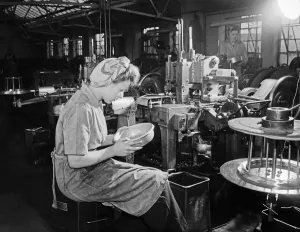Head Scarf Prints: Machinist at Newly Brothers Engineering works in Birmingham. 10th November 1949