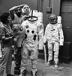 Nasa Prints: Madame Tussauds staff put the finishing touches to waxwork models of astronauts Neil