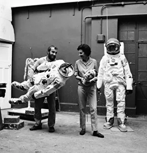 01293 Prints: Madame Tussauds staff put the finishing touches to waxwork models of astronauts Neil
