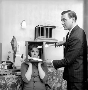 Dressing Room Prints: Magician Bernard Hughes: Performing sword in a box trick with his female assistant