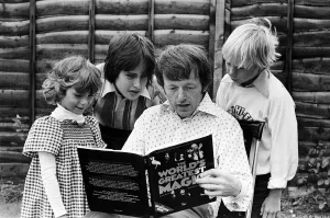 Magician Paul Daniels doing tricks for the children - Martin (15), Lucy (6) and Nicky (9)