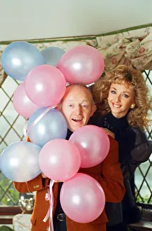 Magician Paul Daniels and his wife Debbie McGee pictured at home. 13th December 1991
