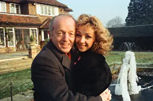 Magician Paul Daniels and his wife Debbie McGee pictured at home. 13th December 1991