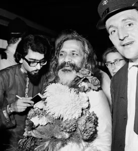 Worship Prints: Maharishi Mahesh Yogi at Euston Station waiting to leave for his summer school in Bangor