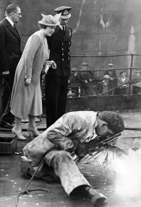 Tyneside Prints: Their Majesties King George VI and Queen Elizabeth watch a welding process in a Tyneside