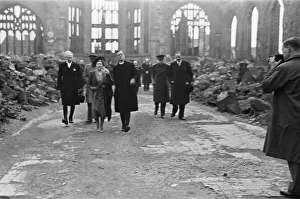 His Majesty King George VI and Queen Elizabeth inspect the damage to the cathedral in