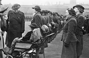 01488 Prints: His Majesty King George VI and Queen Elizabeth meet members of the emergency