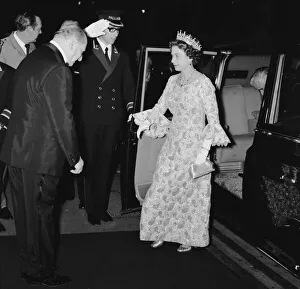 Her Majesty Queen Elizabeth II, is greeted by Media mogul Lew Grade (left)