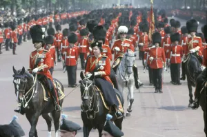 Her Majesty Queen Elizabeth II rides on horseback through The Mall in Central London