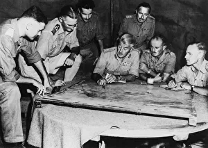 Major General C. E. N. Lomax plans an amphibious operation