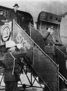 01444 Prints: Major-General Ian Jacob, representing British Chiefs of Staff, returns salute of U. S