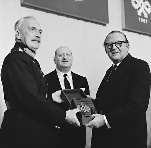 Major General Sir George Burns, Lord Lieutenant of Hertfordshire presents the Queens