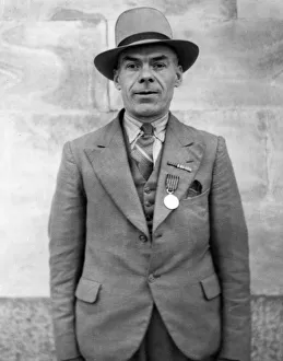 Medals Prints: Major J W Keenan, the Cardiff Night Watchman who is employed by the Petroleum Board