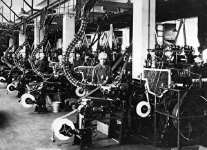 01186 Prints: Making and lining cocoa tins. One of a continuous series of automatic