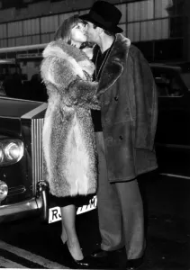 Rolls Royce Prints: Malcolm Allison football manager seen here at Heathrow airport with partner