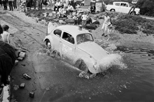 Automobile Prints: Malcolm Buchanan and Bill Helmeage who have spent the last month making a VW watertight