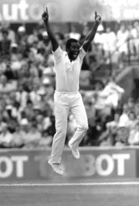 00272 Prints: Malcolm Marshall West Indies cricketer celebrates after taking the wicket of Lamb