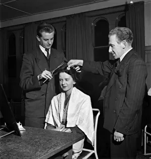 Male apprentices learn ladies hairdressing. March 1952 C1272-002