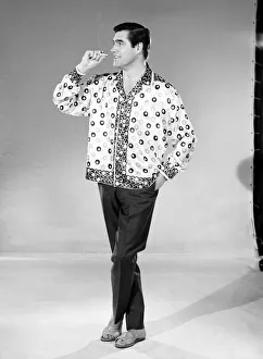 Male model Peter Christian wearing silk shirt. Circa 1964