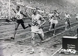 00015 Prints: Malvin Whitfield wins the 800 metre final at the 14th Olympic Games in London, England