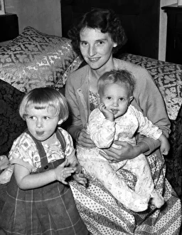 00114 Prints: Mamie Taylor (26), scottish mother who was hurriedly evacuated from riot torn Congo in