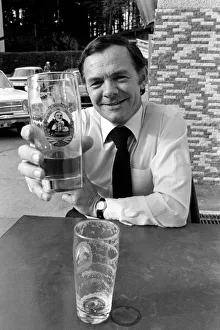 00067 Prints: A man drinking a pint of beer in Munich, West Germany May 1975
