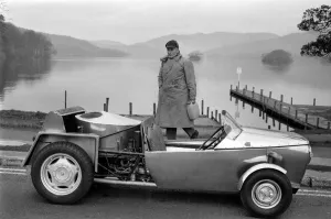 Alternative Prints: Man driving a steam powered out in the countryside December 1970