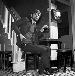 00033 Prints: Man at home drinking a pint of beer. November 1969 Z10987-001