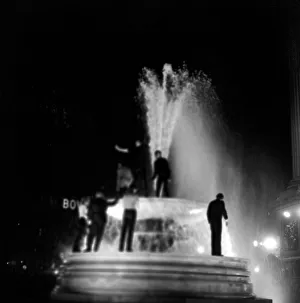A man seen naked in the fountains in Trafalgar Square during New Year celebrations