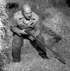 Man with Shotgun: Gerald Hall marksman seen here track down the Godalming Puma