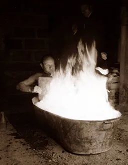 Danger Prints: man sitting in Tub of Flames - man having a bath March 1969