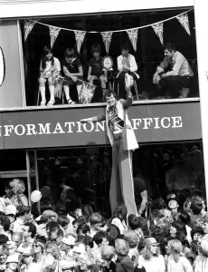 00192 Prints: Man on stilts outside army careers office in the Strand 119981 during celebrations