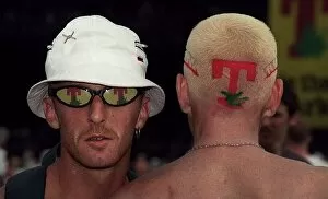 Images Dated 1st July 1999: Man with T in the Park logo sunglasses with the back of a mans head with the T in