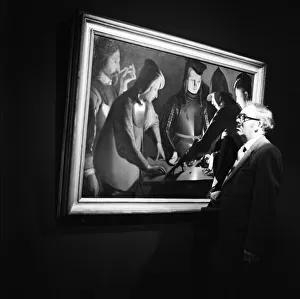 Painting Prints: A man views The Dice Players by Georges de La Tour in Middlesbrough. 1973