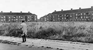Cities Prints: Man walking down a street in the residential suburb f Speke in South Liverpool