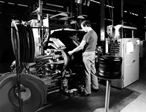 A man working at Fort Dunlop, one of Birminghams best known industrial complexes