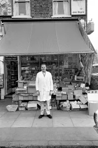 Greengrocer Prints: A man working in his shop at Deptford. November 1969 Z10715-003