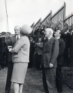 00565 Prints: manager jock stein and chairman bob kelly watch mrs kelly unfurl the league flag