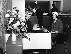 Banking Prints: The Manageress of the ladies only bank, Miss. Margaret Reid (wearing glasses)