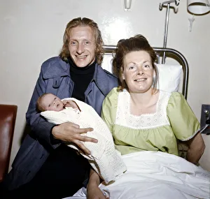 Manchester City footballer Denis Law pictured at home with his wife