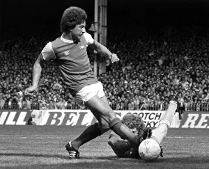 00243 Prints: Manchester City keeper Keith MacRae saves from Alan Sunderland