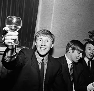 00943 Prints: Manchester City players and management staff celebrate with a few drinks