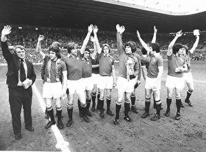 01216 Prints: Manchester United captain Martin Buchan April 1975 holding the 2nd Second